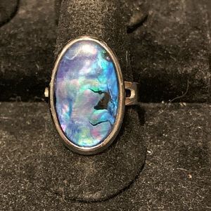 Adjustable silvertone ring with large oval abalone type stone